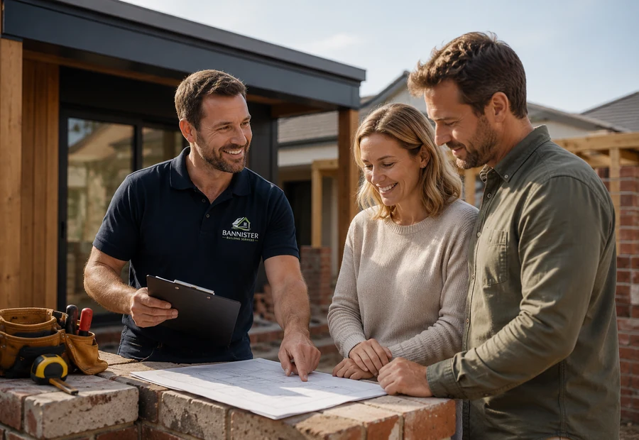 Bannister Building Services contractor discussing building and maintenance work with residential clients